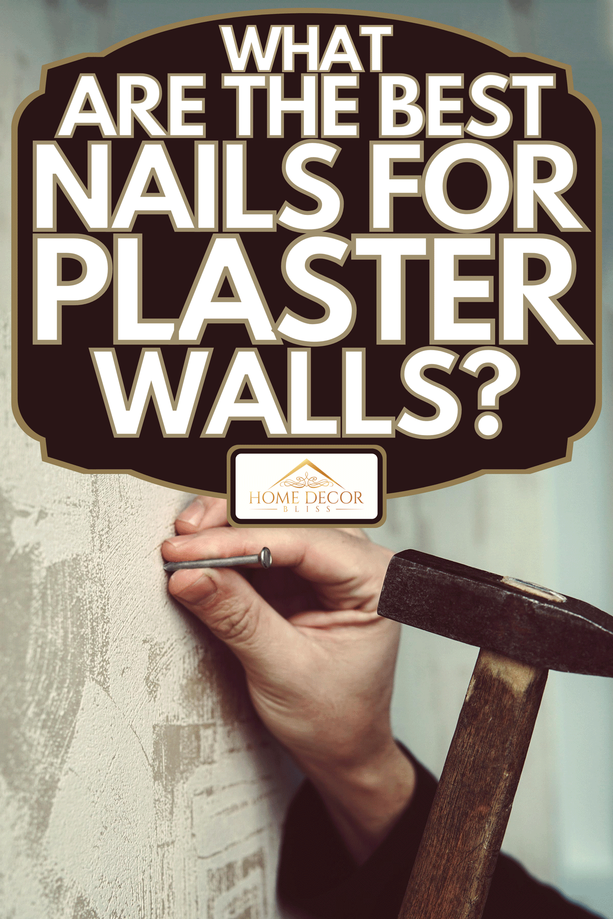 A guy hammering a nail in a plaster wall, What Are The Best Nails For Plaster Walls?