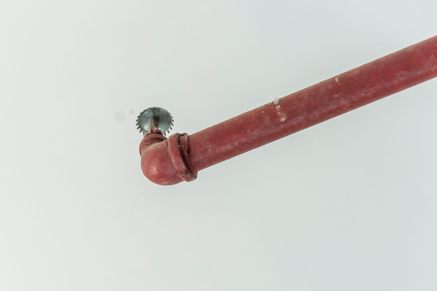 A fire sprinkler on a white background