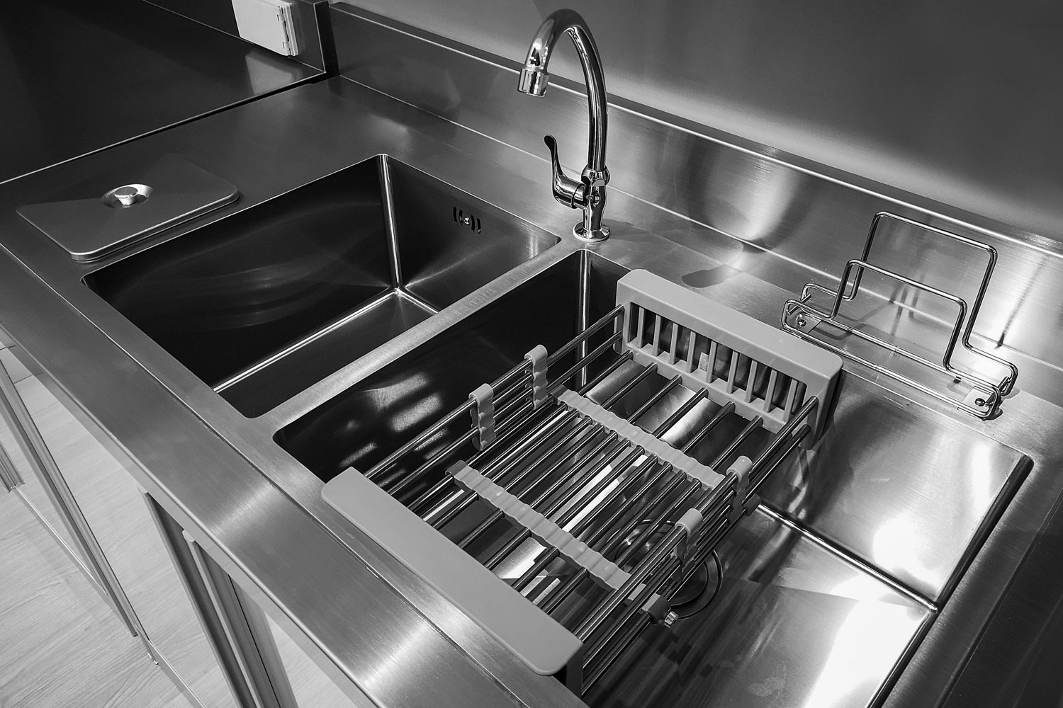 A stainless steel double sink in the kitchen