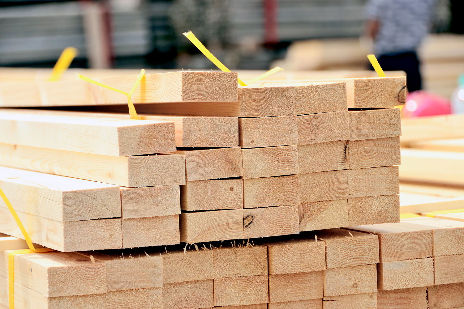 A stockpile of 2x4 wood at a construction site