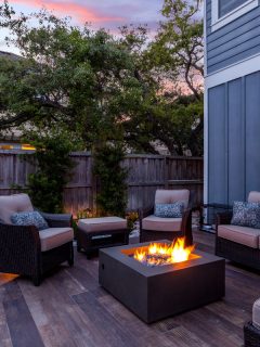 Beautiful backyard firepit at dusk with comfortable chairs, How Much Space Between Fire Pit And Seating?