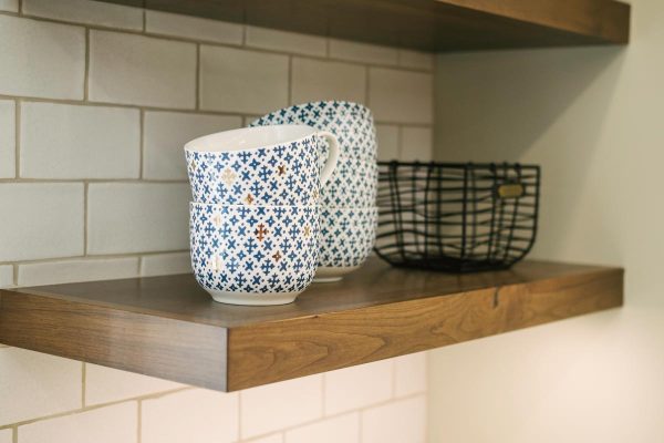 A floating shelves in a kitchen, 11 Creative Ways To Cover Holes In Tiles