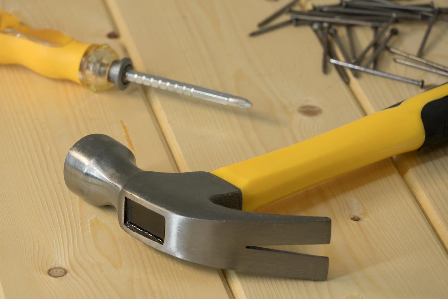 Hammer with nails and screwdriver