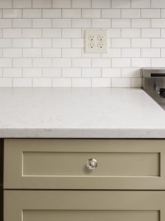Kitchen Counter with Subway Tile, Stainless Steel oven stove, Shaker Cabinets - How To Fill A Gap Between Stove And Cabinet