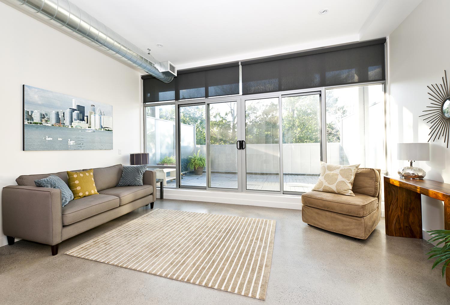 Living room with sliding glass door to balcony