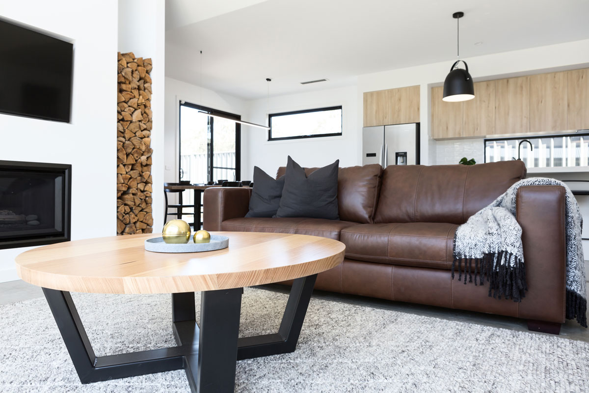 Luxury living room styled with leather sofa and oak coffee table