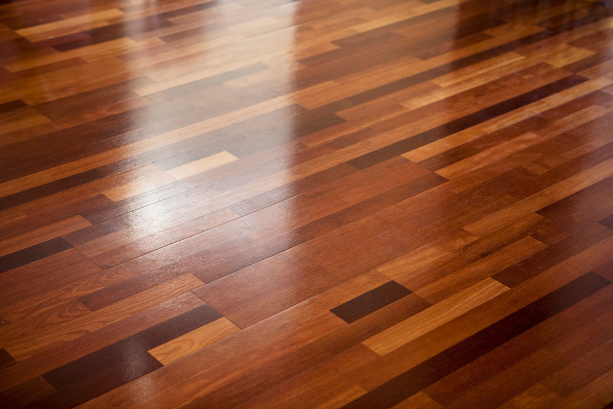 Polished wooden floor texture with diffuse reflections