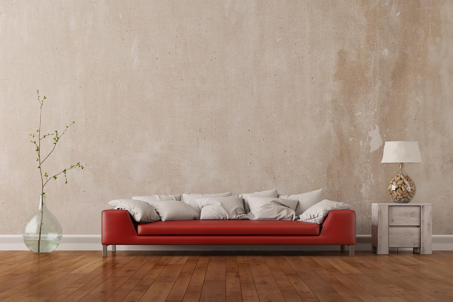 Red sofa standing in living room in front of an empty wall