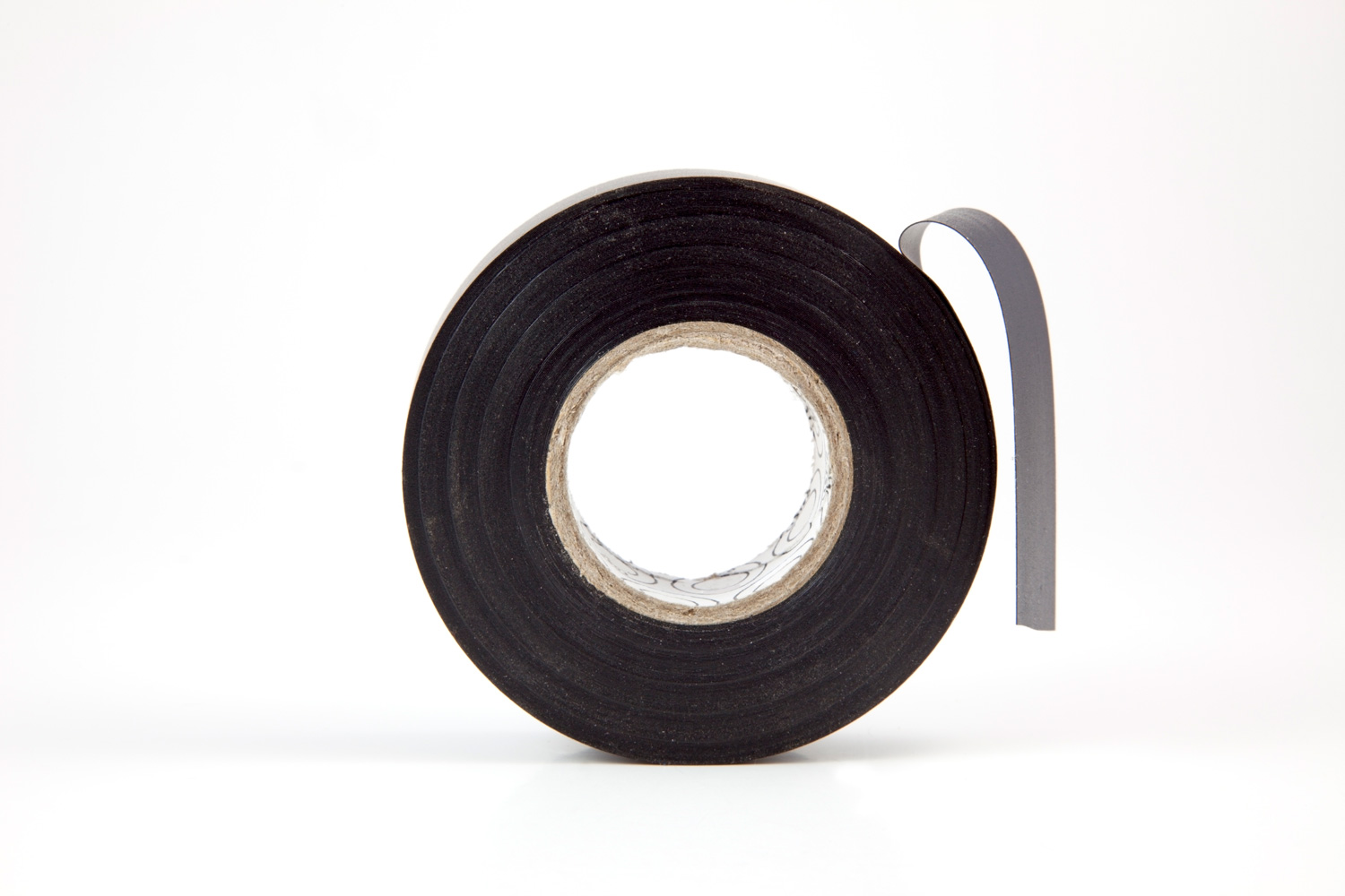 Roll of black electrical tape. Horizontal.