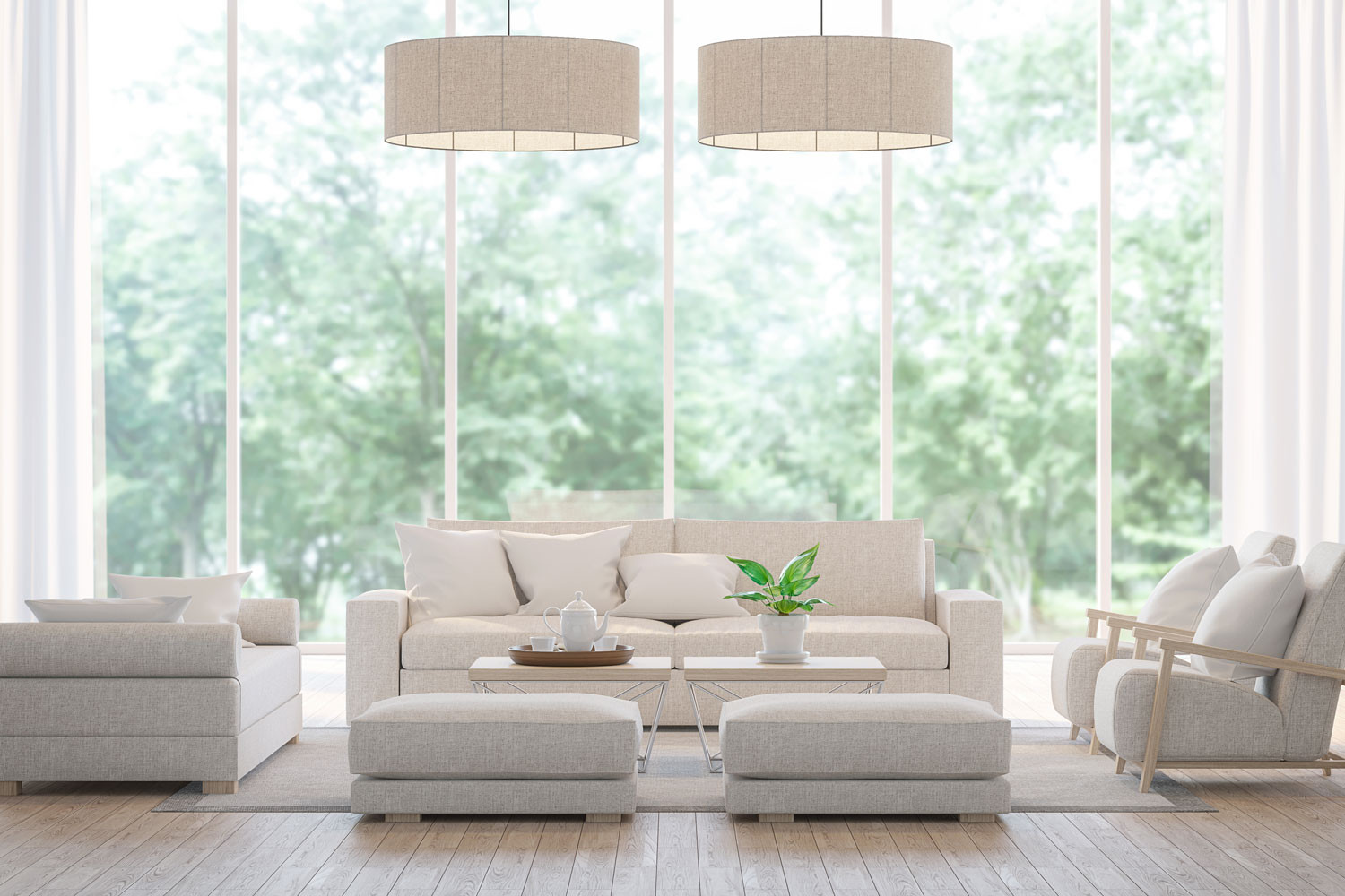 Sectional and modular sofas with square ottomans inside spacious living room with large dangling lamps