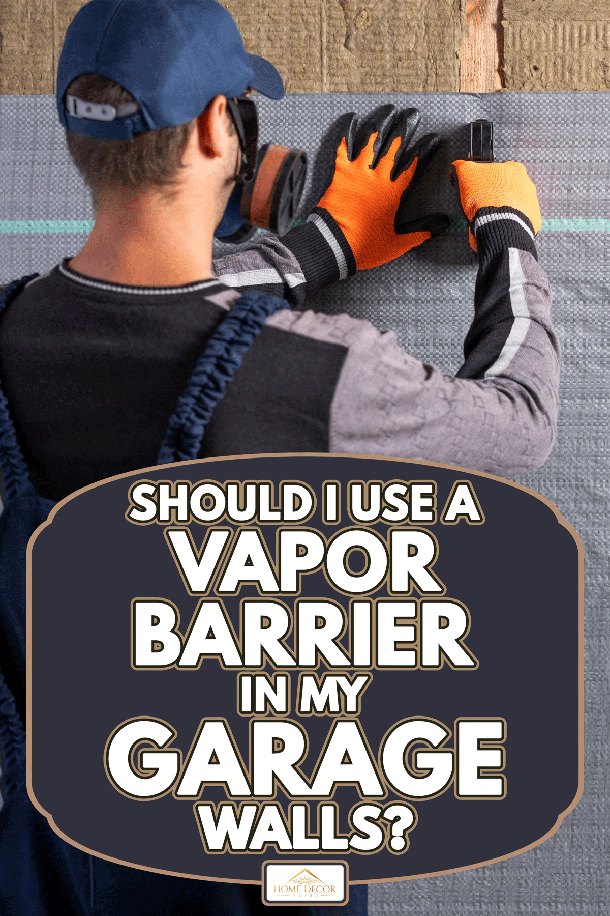 Worker in using a stapler to mounts a vapor barrier in the wall, Should I Use A Vapor Barrier In My Garage Walls?