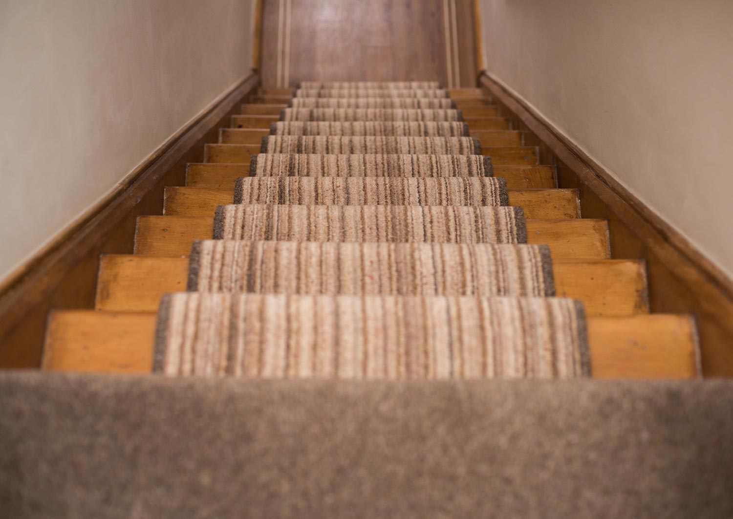 Staircase with carpet runner