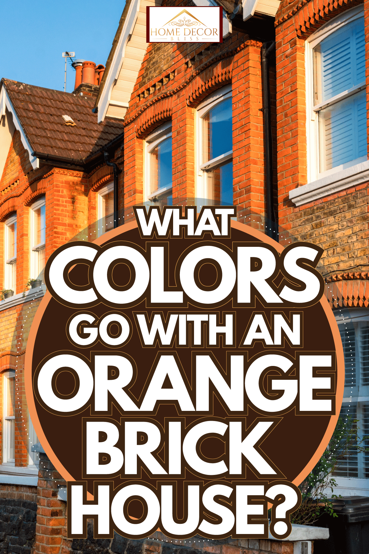 Orange apartment houses with white trims and flowers on the front porch, What Colors Go With An Orange Brick House?