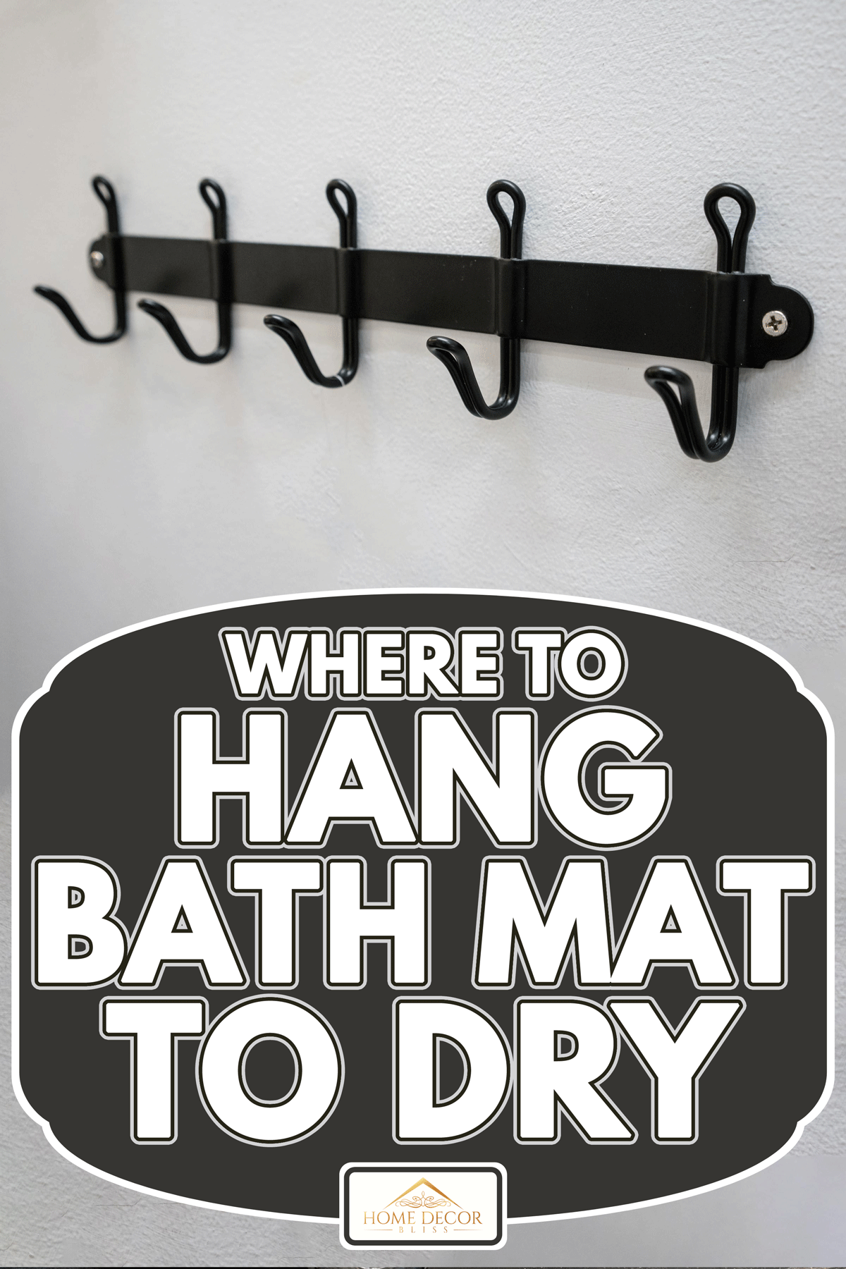 Black metal wall hanger mounted against white wall, Where To Hang Bath Mat To Dry