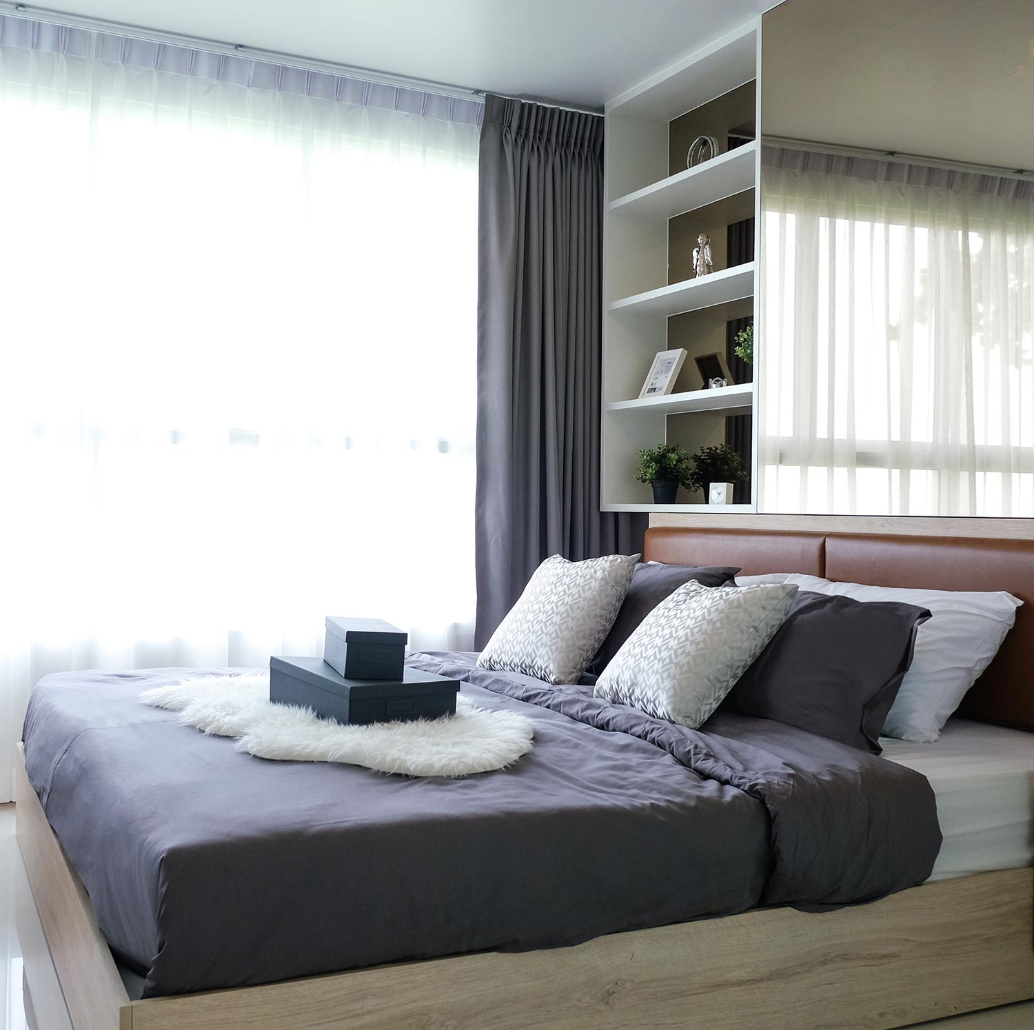 Wooden bed in room