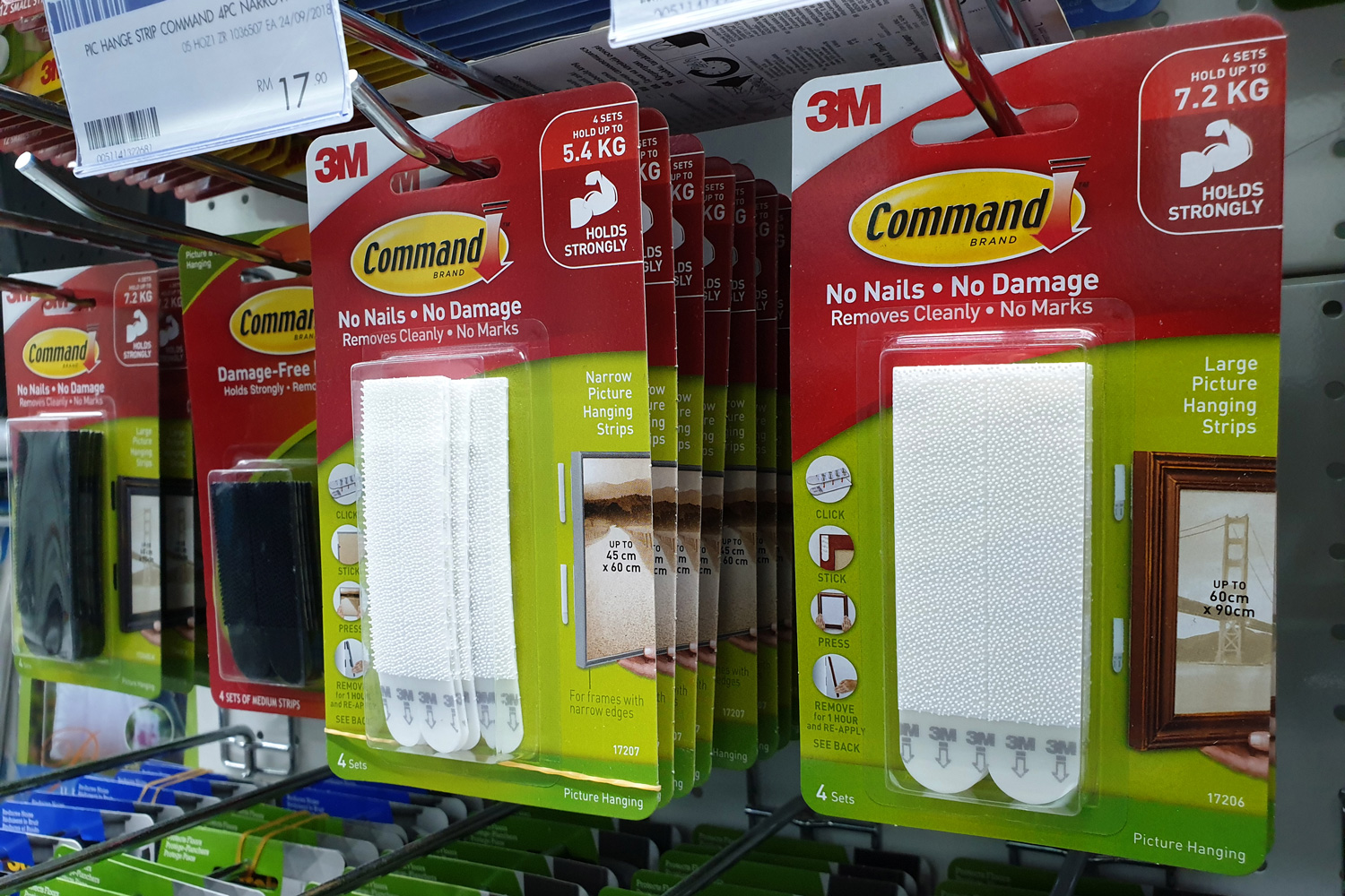 Command brand Picture Hanging Strips and Hooks by 3M company on store shelf