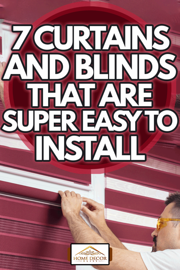 Young man in a uniform installing new window blinds, 7 Curtains And Blinds That Are Super Easy To Install