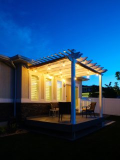 A porch with gorgeous trellis and ceiling lights left turned on, What Does Leaving The Porch Light On Mean?