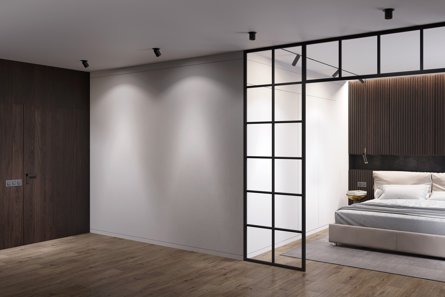 Dark modern interior with a gray wall illuminated by two spotlights, a dark wood door, a modern room divider, a bedroom with dark wood cabinets over a beige bed, a closet in the background.