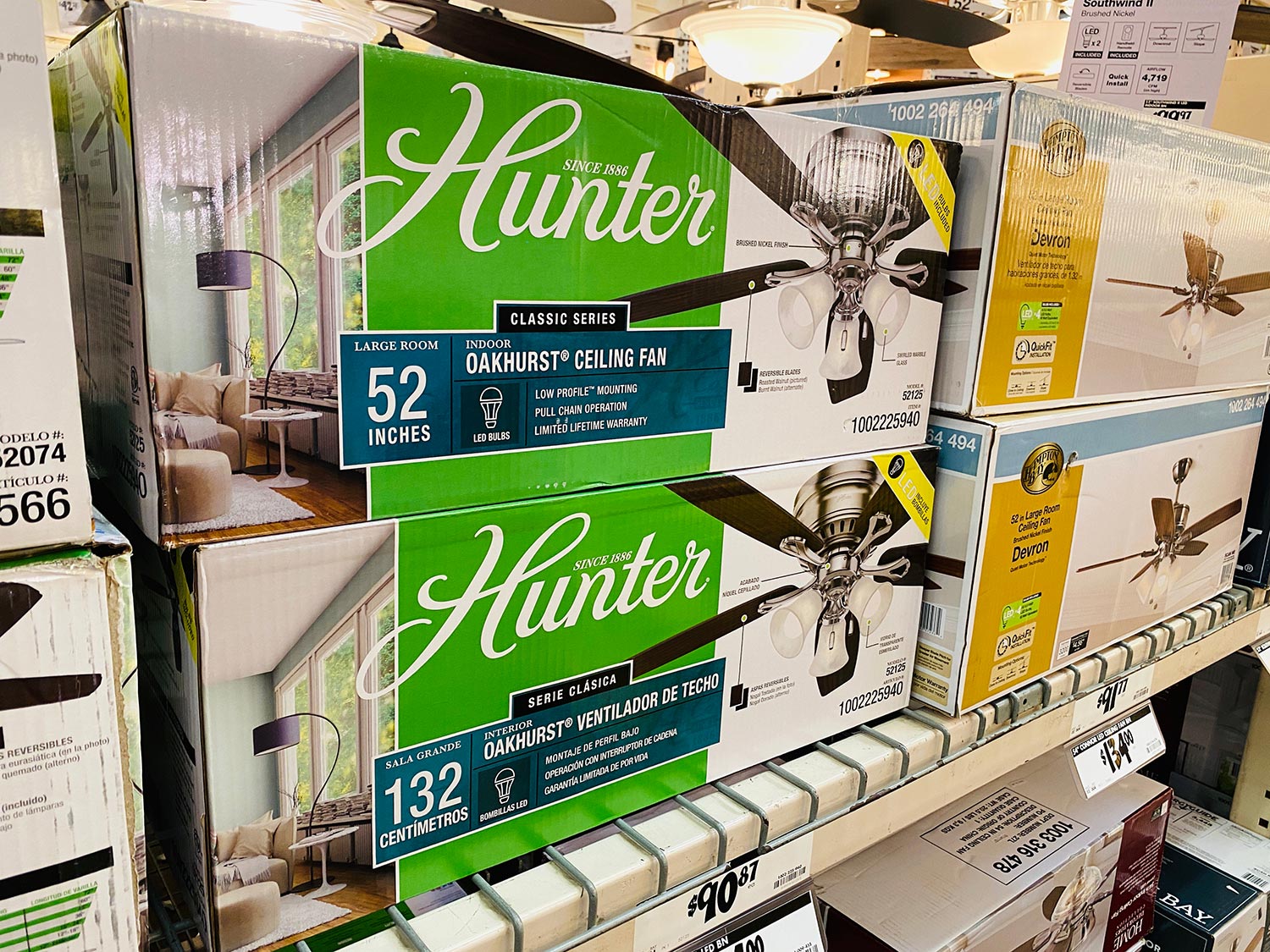 Hunter brand of ceiling fans in boxes on shelf