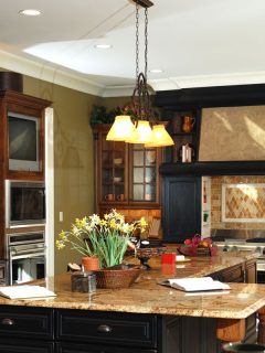 Large luxurious kitchen interior with many upgrades, What Backsplash Goes With Brown Granite?