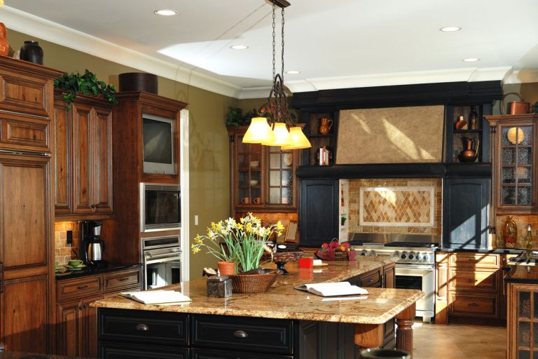 Large luxurious kitchen interior with many upgrades, What Backsplash Goes With Brown Granite?