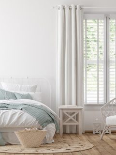 A light farmhouse bedroom, How To Hide An Off Center Window