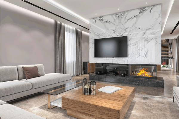 Modern luxury living room interior with large TV above a fireplace. How Big Should TV Be Over Fireplace