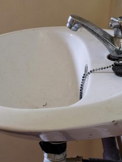 An old and dusty sink with cracked, Sink Cracked All The Way Through - What To Do?