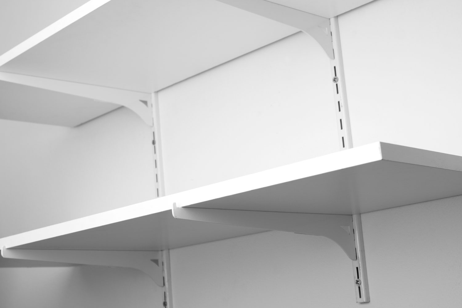 White shelves and matching white brackets