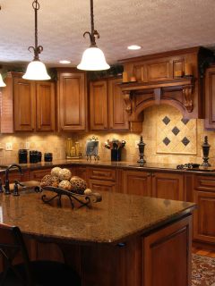 A beautiful interior of a custom kitchen, What Color Island Goes With Cherry Cabinets?