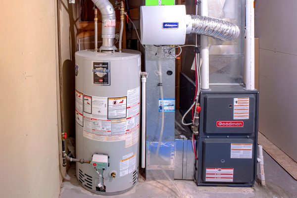 A home Goodman high efficiency furnace with Bradford White Residential gas water heater & an Generalaire humidifier, How Much Does It Cost To Move A Furnace?