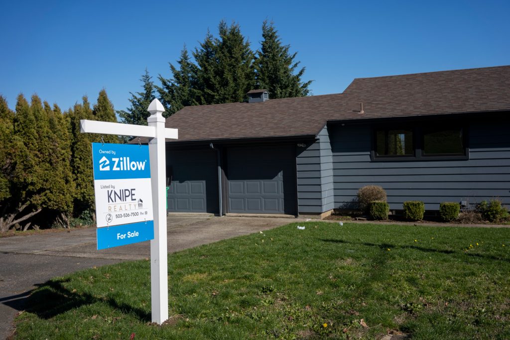  A single-family house owned by Zillow is seen for sale in southwest Portland, Oregon. Zillow exited its iBuyer business, Zillow Offers, at the end of 2021.