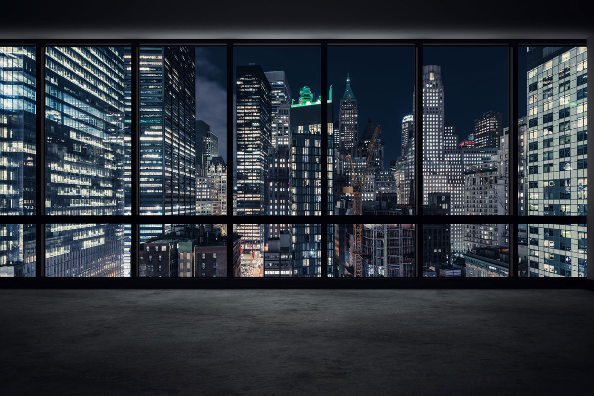 Black window and a view of manhattan at night