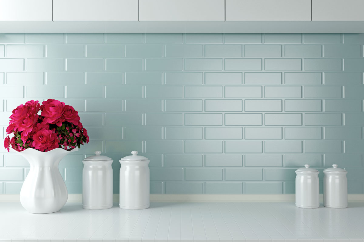 Blue brick backsplash and white canisters with for kitchen spices