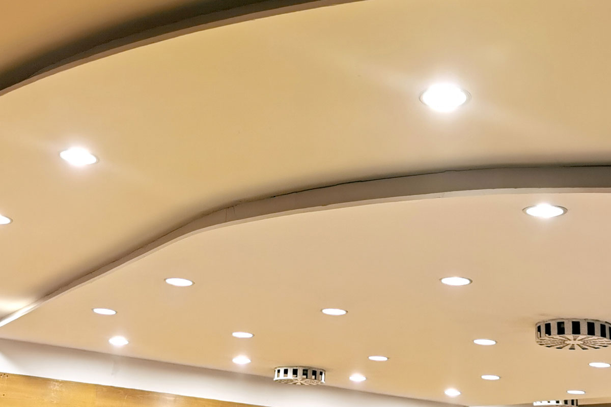 Ceiling in the concert hall with lights on and ventilation system
