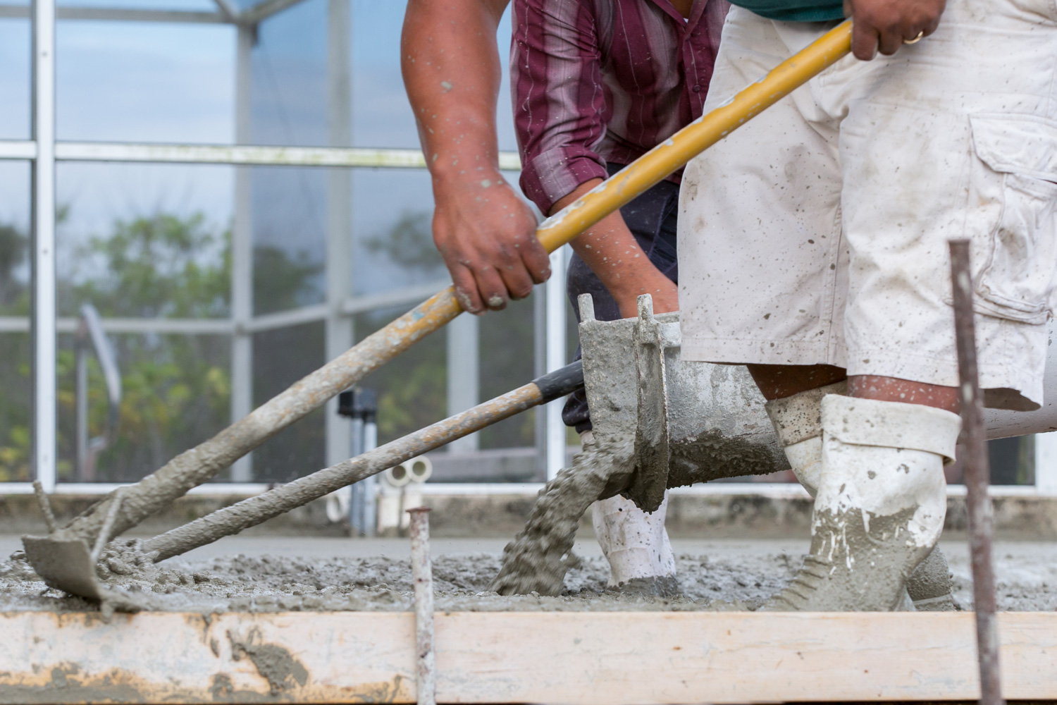 Cement Pour Worker's pouring a cement patio