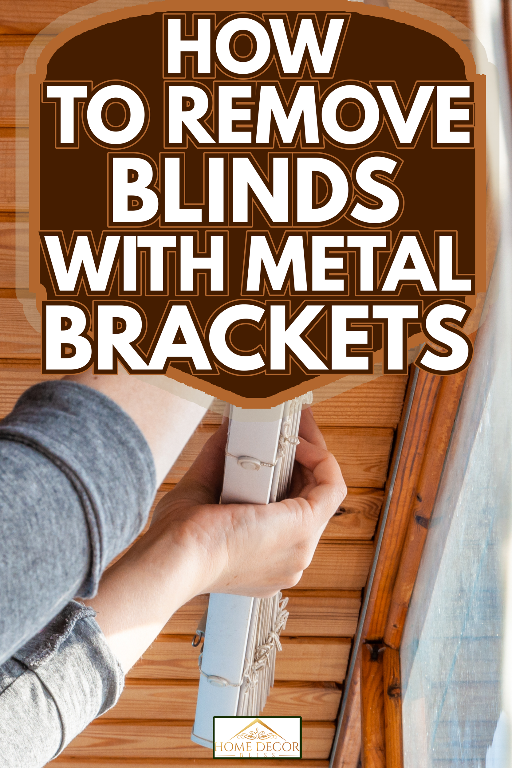 Close-up of a woman's hands holding blinds, a woman removes white plastic blinds from a wooden ceiling - How To Remove Blinds With Metal Brackets