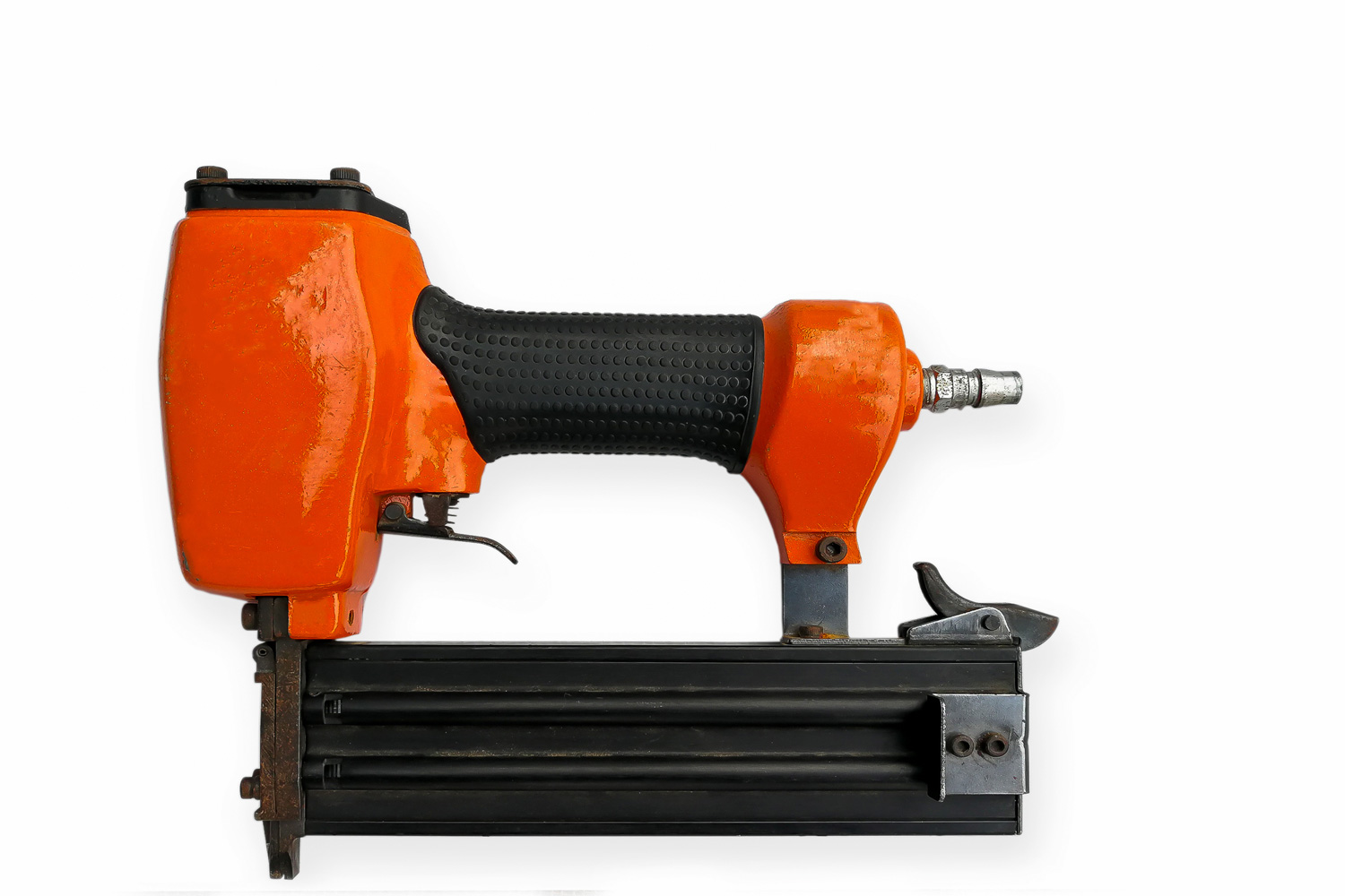 Compressed air brad nailer on white background