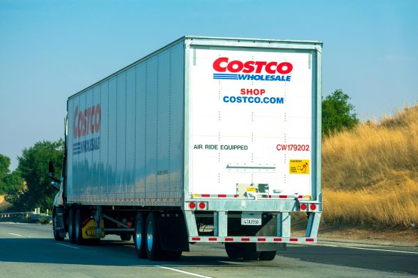 A Costco Wholesale sign and logo on the side of delivery truck, Does Costco Install Dishwashers And Other Appliances?