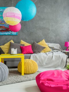 Cozy living room in grey with window, modern furniture and colorful details, 15 Funky Living Room Ideas You Should See