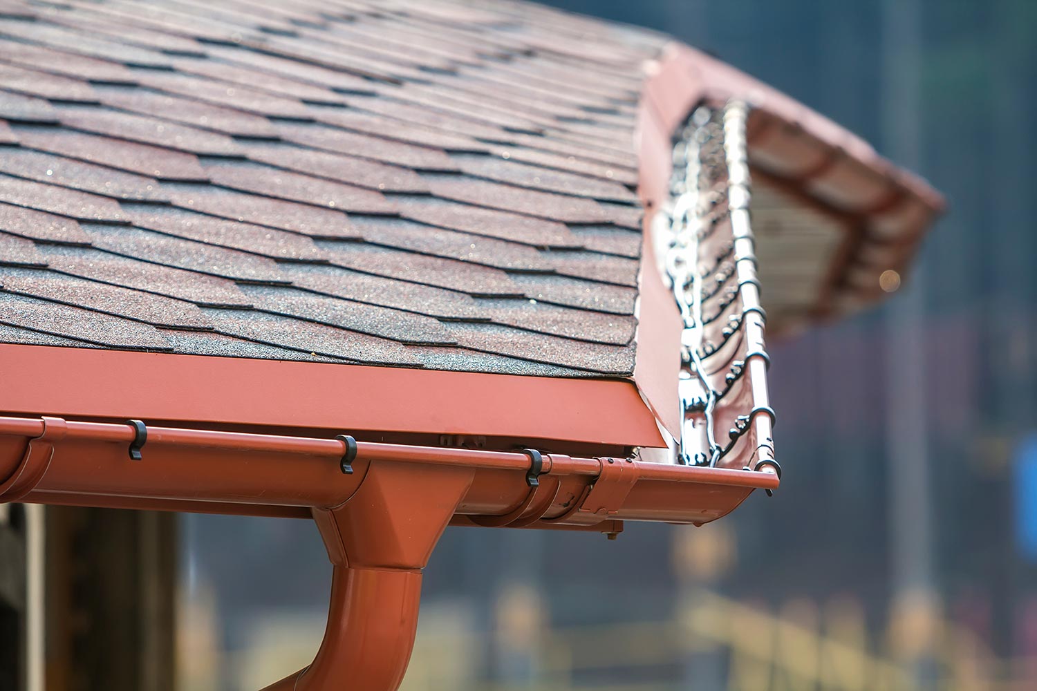 Detail image of new roof with gutter rain system