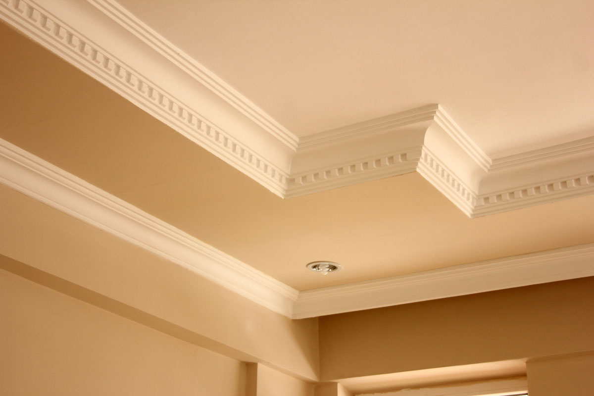 Elegant ceiling with tan and cream paint colors