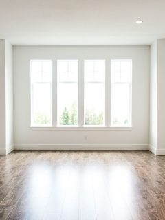 Empty white color living room, How Much Paint For A 10X10 Room?