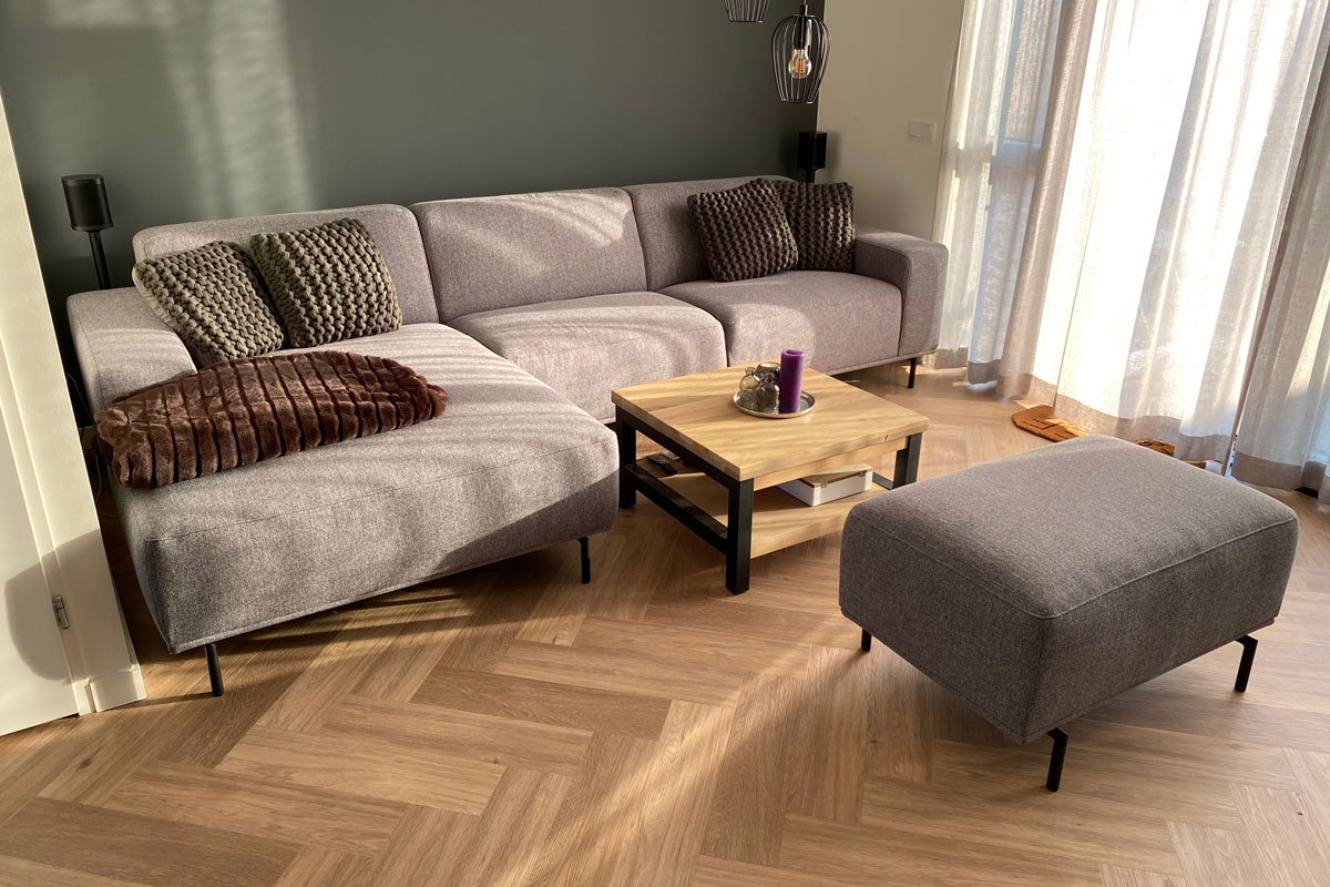 Herringbone PVC flooring with decoration in the living room with beautiful set up of sofa