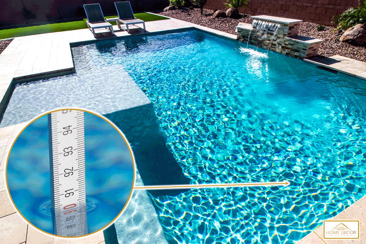A residential pool in the back yard with two lounge chairs, How Deep Can A Residential Pool Be?
