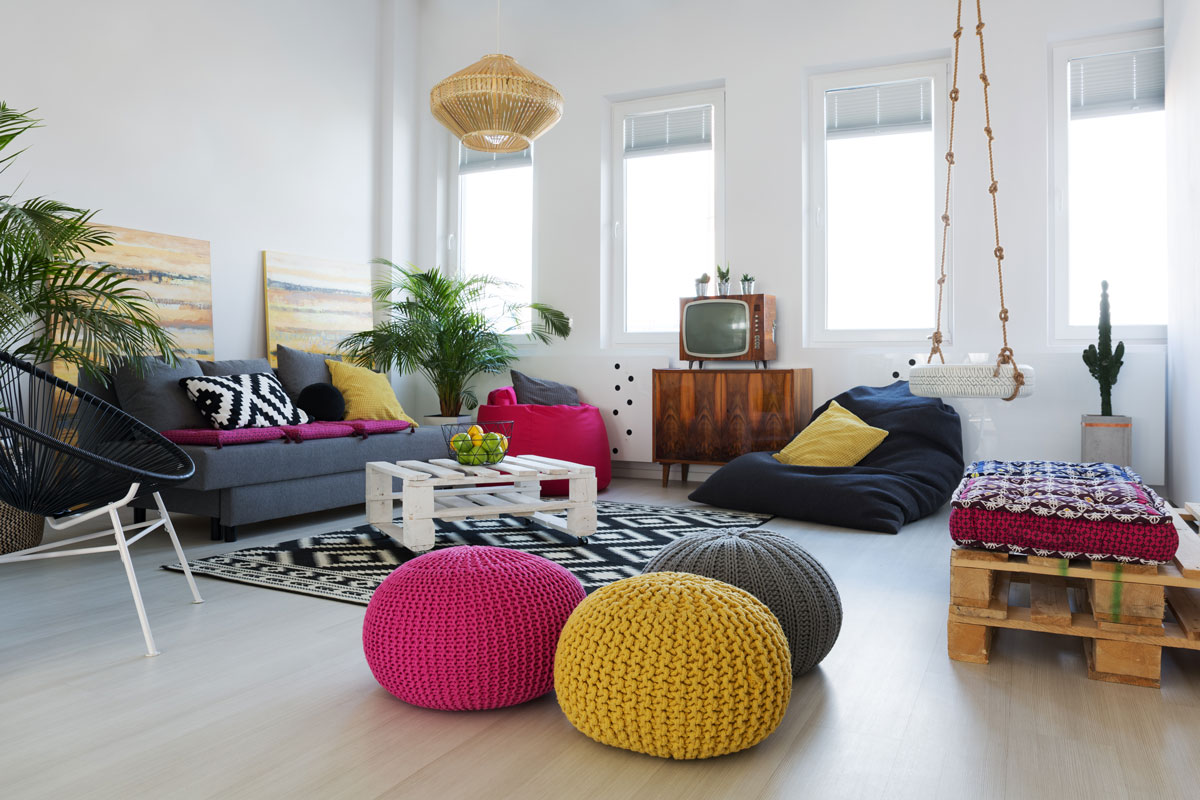 Inspiring colorful retro living room with swing in stylish loft