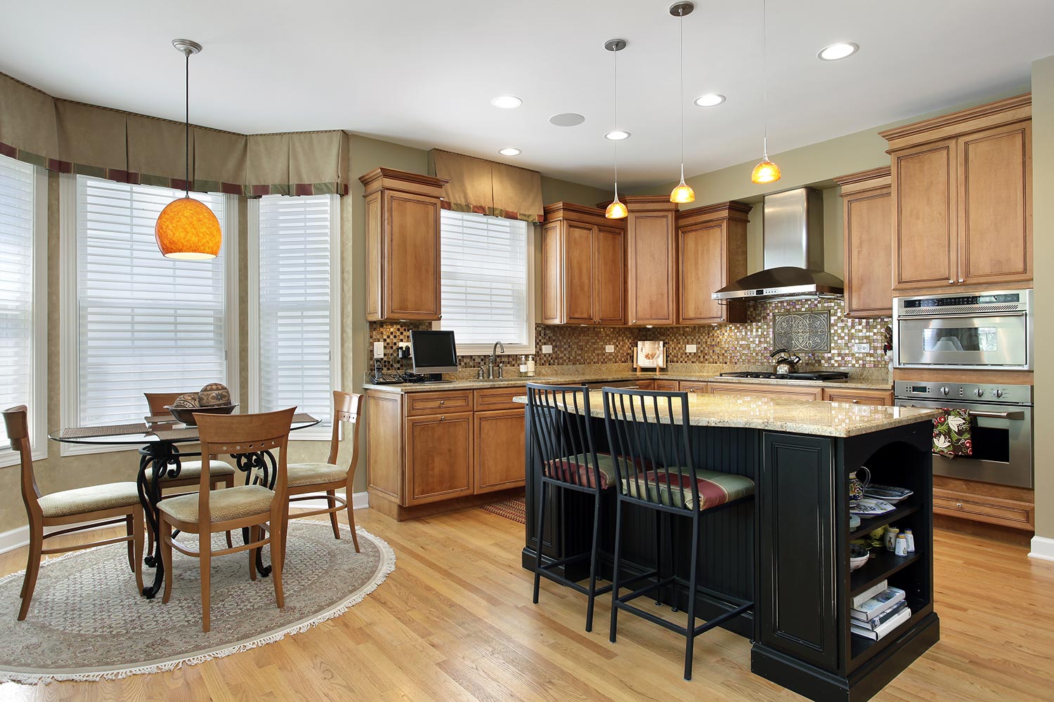 Kitchen with oak wood cabinetry and center island