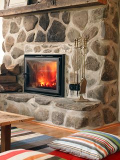 Log cabin stone fireplace - How To Whitewash A Stone Fireplace With Chalk Paint