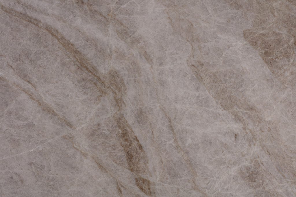 Natural Taj Mahal calcite background in gentle grey tone, photo of slab texture as part of your adorable new design look.